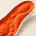 Close-up of orange mesh heel and sculpted white foam